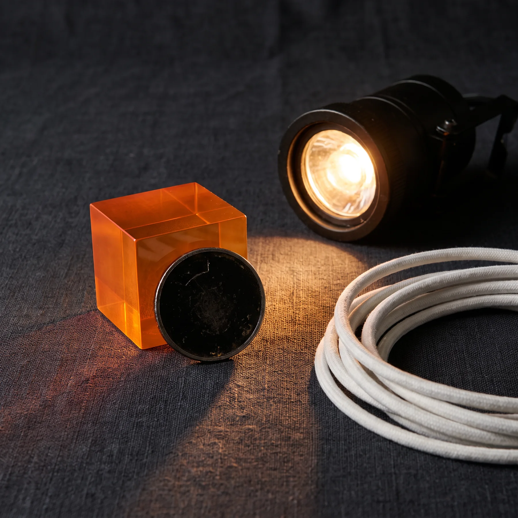 Stage light and cable on a work surface